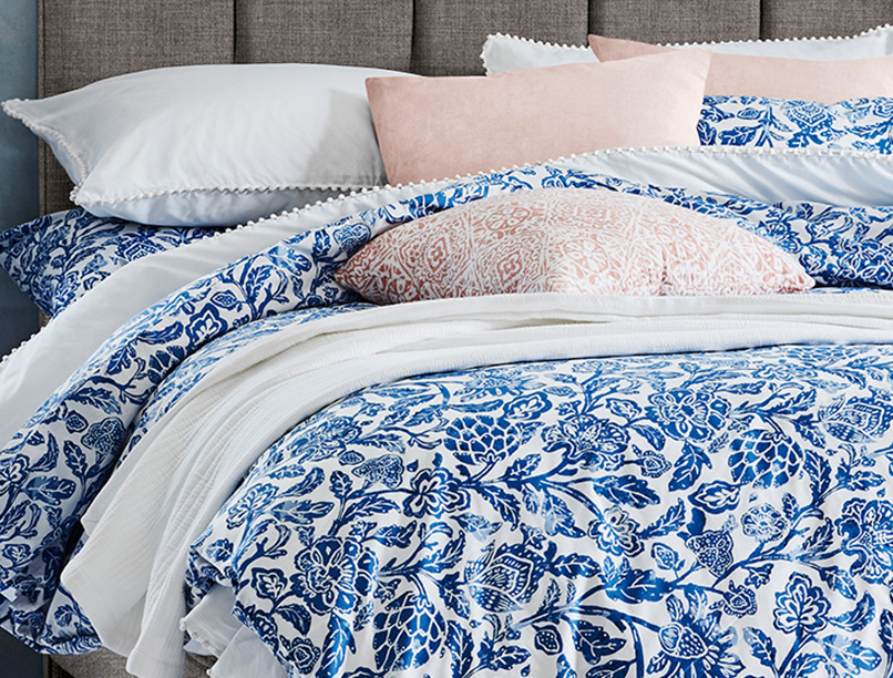 A blue floral print bedding set